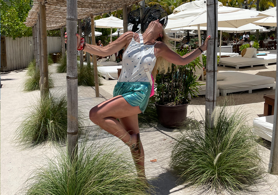 Woman having fun on a tour of South Beach in Miami Beach, FL.